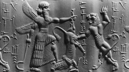 Winged pagan god in Mesopotamian relief